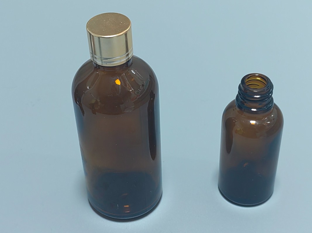 Опаковка эфирного масла 1OZ 2OZ 20ml 30ml 50ml серум эфирного масла янтаря Стеклянная капельничная бутылка с детской крышкой